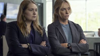 This image released by Netflix shows Merritt Wever, left, and Toni Collette in the true crime series "Unbelievable." 