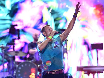  Chris Martin of the band ColdPlay perform on stage during day four of Glastonbury Festival 2024 at Worthy Farm, Pilton on June 29, 2024 in Glastonbury, England. Founded by Michael Eavis in 1970, Glastonbury Festival features around 3,000 performances across over 80 stages. Renowned for its vibrant atmosphere and iconic Pyramid Stage, the festival offers a diverse lineup of music and arts, embodying a spirit of community, creativity, and environmental consciousness