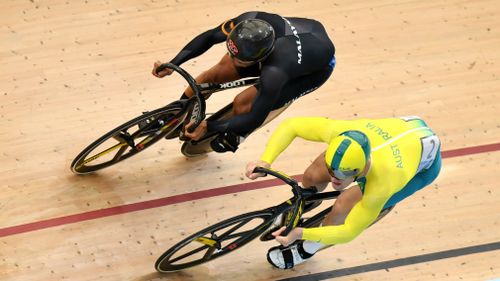 Glaetzer of Australia and Muhammad Shah Firdaus Sahrom of Malaysia during the men's sprint qualifying event. (AAP)