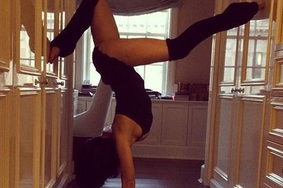 Handstands in legwarmers and a leotard?! That's just how Hilaria rolls.. erm, we mean backflips.