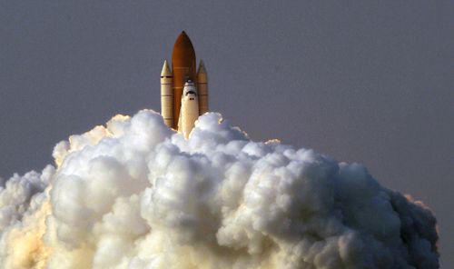 The photojournalist captured many iconic moments during his years at AP, including the space shuttle Endeavour lifting off from the Kennedy Space Center in 2007. Picture: Alan Diaz / AP