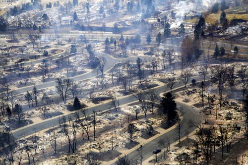 A view of a Boulder County neighborhood that was destroyed by a wildfire is seen from a Colorado National Guard helicopter.