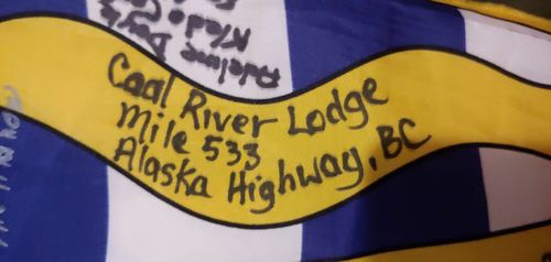 Many road house lodges on the remote Alaska Highway, a highway to reach Alaska through BC, have signed the flag. 