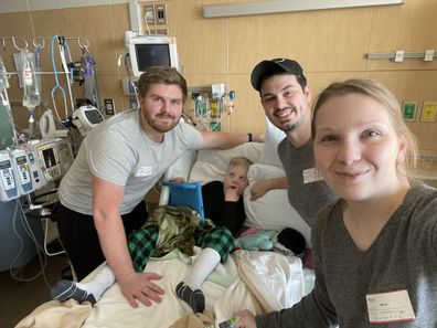 Gabryel with his family while in hospital. 