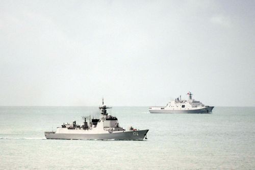 Chinese Luyang-class guided-missile destroyer (left) and Yuzhao-class amphibious transport dock vessel