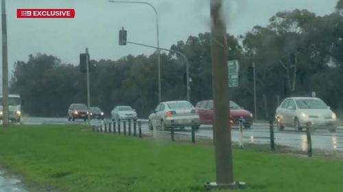 A South Australian woman is in custody after being filmed travelling on the wrong side of the road while allegedly drink driving and with a toddler in the back seat. 