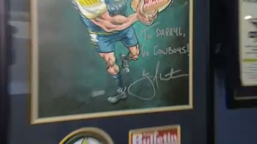 Jonathan Thurston has signed a caricature.