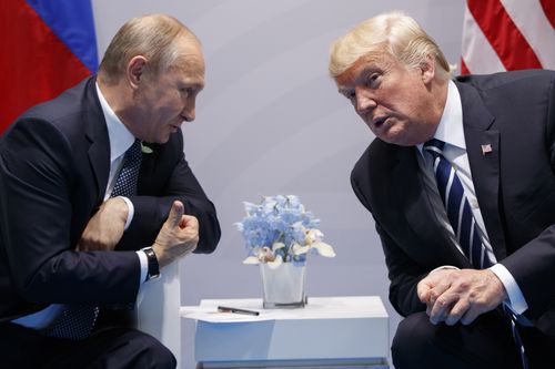 President Donald Trump meets with Russian President Vladimir Putin at the G-20 Summit in Germany last year. Picture: AAP
