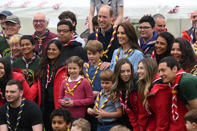 Catherine, Princess of Wales, Prince William, Prince of Wales, Prince George of Wales, Prince Louis of Wales and Princess Charlotte of Wales pose for a group pictures with volunteers who are taking part in the Big Help Out, during a visit to the 3rd Upton Scouts Hut in Slough on May 8, 2023