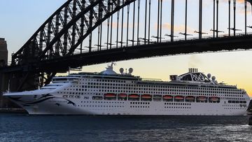 P&amp;O Cruises Australia&#x27;s flagship Pacific Explorer passes under the Harbour Bridge on its first guest cruise following the restart of cruising in Australia on May 31, 2022.