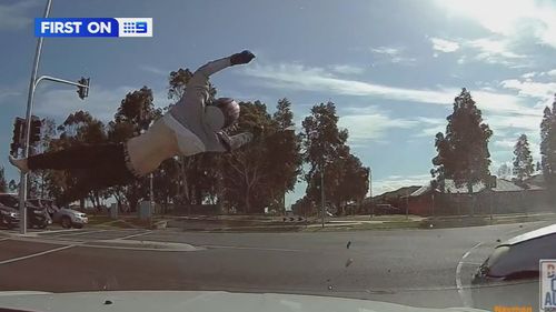 Video shows the moment the accident unfolds, with the rider clipping a four wheel drive at a busy intersection in Melbourne's south-east.