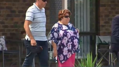 The mother of accused gunman Brenton Tarrant can be seen leaving a property following the raids.