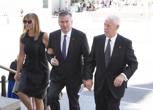 Carla McGuire (left) and Eddie McGuire (middle) arrive for the state funeral service for Ron Walker, former F1 Australia Grand Prix boss and a former Melbourne Lord Mayor. (AAP)