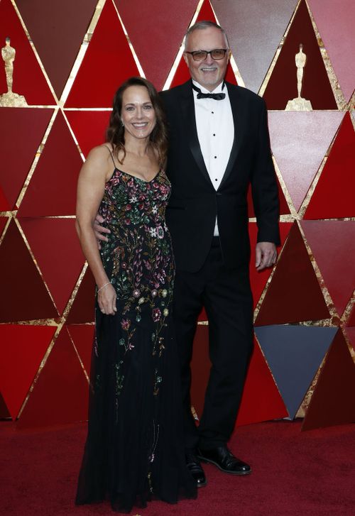 Lee Smith and wife Kimberly arrive at the Dolby Theatre. (AAP)