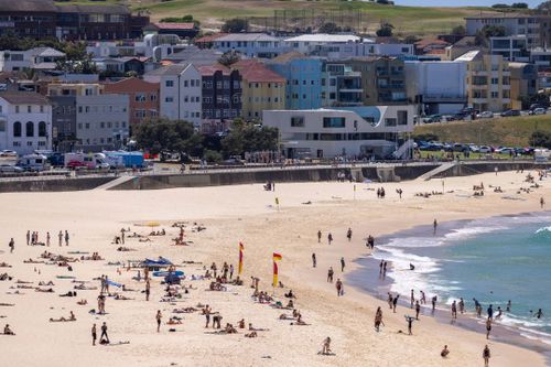 Beachgoers return to Bondi Beach, four days after gunmen killed 15 people in a terrorist attack. Thursday 18th December 2025. Photo: Sitthixay Ditthavong
