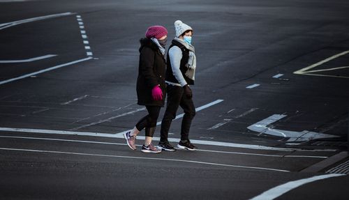 Woman wearing masks walk along Sturt Street in Ballarat on August 21, 2020 in Ballarat, Australia. 