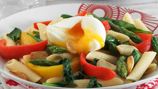 Pasta with roasted vegetables and poached egg