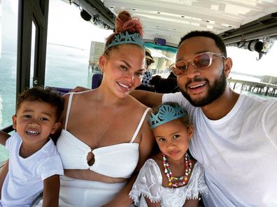 Chrissy Teigan and John Legend alongside their kids Luna and Miles. 