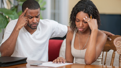Couple looking at financial documents 