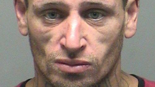 Violent prison escapee with 'thug' neck tattoo captured in Hobart bushland