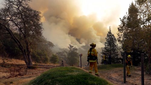 17 large fires are still burning across the northern part of California. (AP)