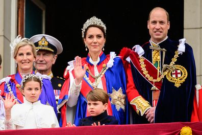 Catherine, Princess of Wales, waves from the balcony of Buckingham Palace with Prince William, Prince of Wales and Princess Charlotte and Prince Louis during the Coronation of King Charles III and Queen Camilla on May 06, 2023