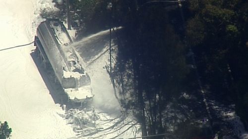 Fire and Rescue NSW crews applied foam to the vehicle to extinguish the flames.