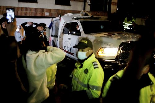 A car of Colombian investigators leaves the hotel where U.S. drummer Taylor Hawkins was found dead in Bogota, Colombia, Saturday, March 26, 2022. 