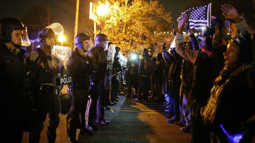 Police face off with protesters in Ferguson, Missouri, in 2014. (AAP)