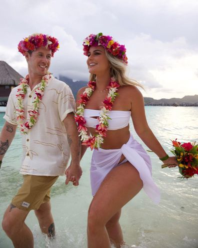 Karina Irby on her wedding day, saying "I do" in a white bikini.