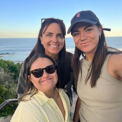 Millie Boyle with her mum (centre) and sister Hannah (left).