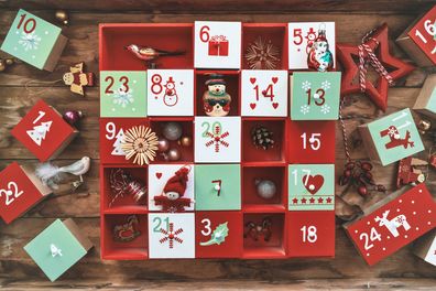 Wooden advent calendar with vintage decoration.