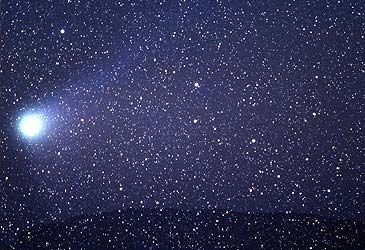 Edmond Halley calculated his namesake comet passed by Earth how frequently?