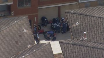 A boy has been taken to hospital after falling from a building in south Sydney.