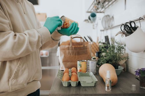 Health authorities in the US say  there's no real risk of getting the virus from grocery bags or takeout boxes but recommend washing your hands.