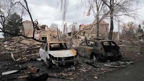Gutted cars following a night air raid in the village of Bushiv, west of Kyiv.