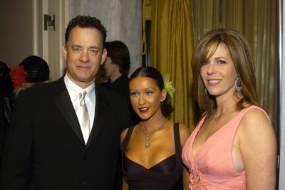 Singer Christina Aguilera with Tom Hanks and Rita Wilson during EIF's Cancer Research Fund at Regent Beverly Wilshire in Beverly Hills in 2004