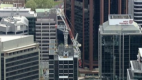 Arthur Street has been closed below the building and motorists are advised to avoid the area. (9NEWS)