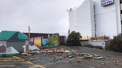 Damage caused by the waterspout was visible in a carpark. (9NEWS)