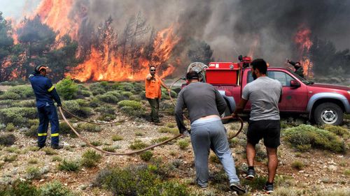 The speed with which the blaze northeast of Athens spread took many by surprise, and is believed to have contributed to the high death toll. Picture: EPA