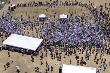 This photo taken by a drone and provided by the City of Kyle, Texas, shows an attempt by the city to break the world record for the largest gathering of people with one name, Saturday, May 18, 2024, in Kyle. (City of Kyle, Texas via AP)
