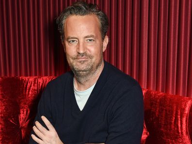 Matthew Perry poses at a photocall for "The End Of Longing", a new play which he wrote and stars in at The Playhouse Theatre, on February 8, 2016 in London, England.  