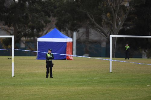 Police cordon off the area in Princes Park after Ms Dixon's body was found. Picture: AAP