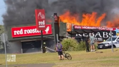 The Red Rooster and a neighbouring kebab shop collapsed under the intensity of the fire.