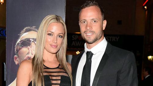 Reeva Steenkamp with Oscar Pistorious. (Getty)