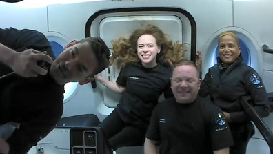 This photo provided by SpaceX shows the passengers of Inspiration4 in the Dragon capsule on their first day in space. They are, from left, Jared Isaacman, Hayley Arceneaux, Chris Sembroski and Sian Proctor. SpaceX got them into a 363-mile (585-kilometre) orbit following Wednesday night's launch from NASA's Kennedy Space Center. That's 100 miles (160 kilometres) higher than the International Space Station.