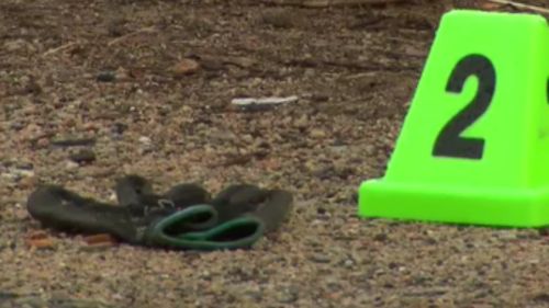 A black glove found at the property may hold the key to the murder investigation. (9NEWS)