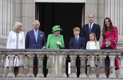From left, Camilla, Duchess of Cornwall, Prince Charles, Queen Elizabeth II, Prince George, Prince William, Princess Charlotte,  Prince Louis and Kate, Duchess of Cambridge stand on the balcony, at the end of the Platinum Jubilee Pageant held outside Buckingham Palace, in London, Sunday June 5, 2022, on the last of four days of celebrations to mark the Platinum Jubilee.  