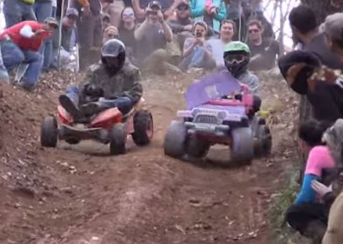 Big girls' toys - Adults racing in the downhill Extreme Barbie Jeep Racing tournament . (Busted Knuckle Video)