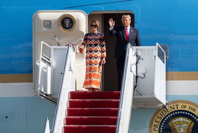A more relaxed Melania arrives in Florida with Donald Trump